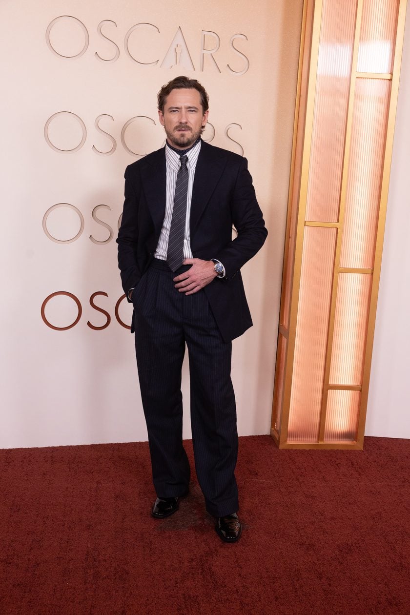 Lewis Pullman i Omega De Ville Prestige / foto: Etienne Laurent - The Academy / ©A.M.P.A.S.